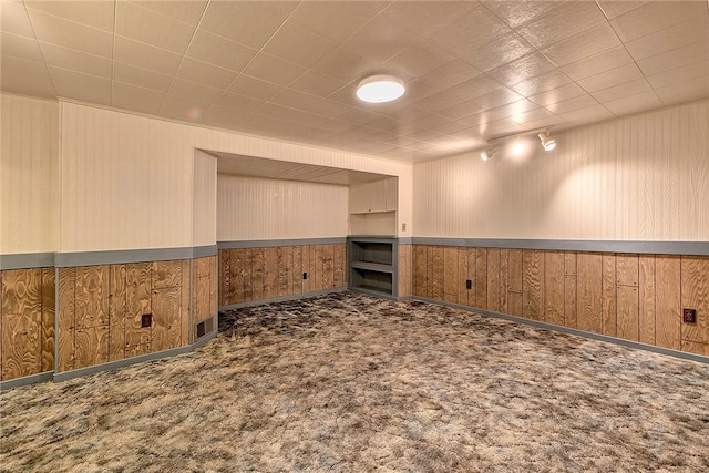 511 New Haven Dr, Hempfield Twp, PA 15601 - carpeted spare room with wooden walls and a wainscoted wall