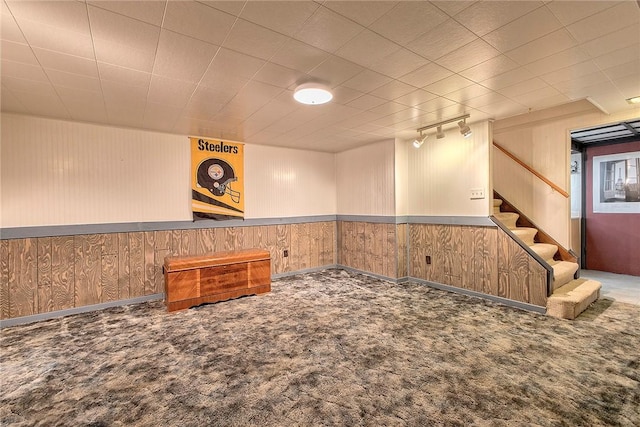 511 New Haven Dr, Hempfield Twp, PA 15601 - finished below grade area with carpet, stairs, wooden walls, and wainscoting