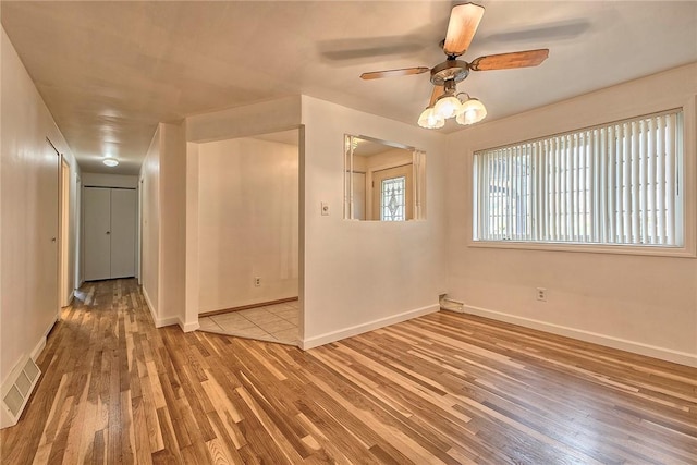 511 New Haven Dr, Hempfield Twp, PA 15601 - spare room featuring light wood-type flooring and ceiling fan