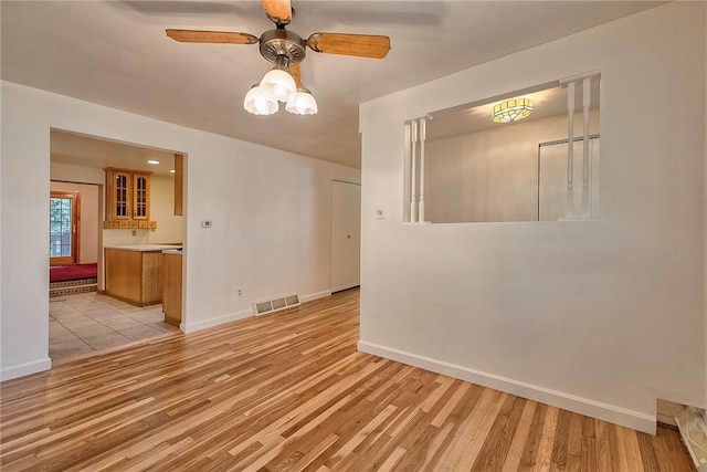 511 New Haven Dr, Hempfield Twp, PA 15601 - unfurnished room featuring light wood finished floors and ceiling fan