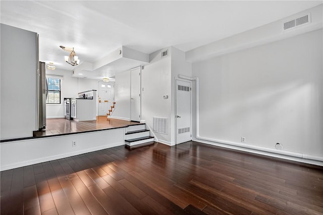 1152 Pennsbury Blvd, Pennsbury, PA 15205 - unfurnished room featuring hardwood / wood-style floors, a chandelier, and stairway