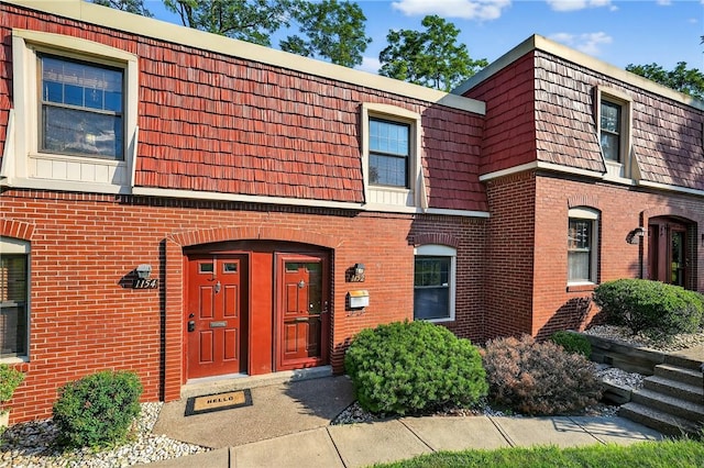 1152 Pennsbury Blvd, Pennsbury, PA 15205 - townhome / multi-family property featuring brick siding and mansard roof