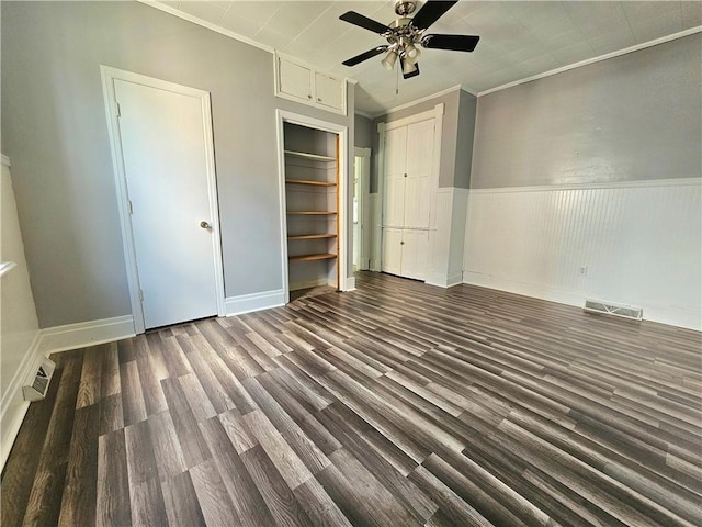 1908 6th Ave, Beaver Falls, PA 15010 - unfurnished bedroom with wood finished floors, crown molding, a wainscoted wall, and ceiling fan