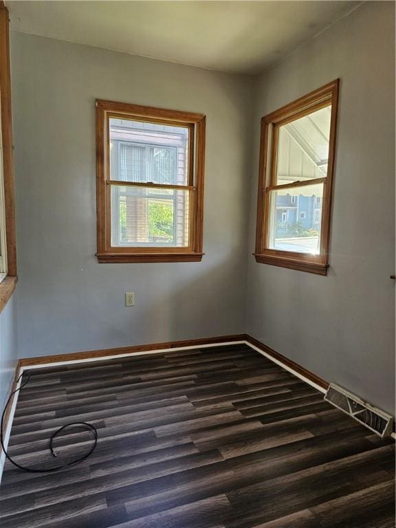 1908 6th Ave, Beaver Falls, PA 15010 - empty room featuring dark wood-style floors and baseboards