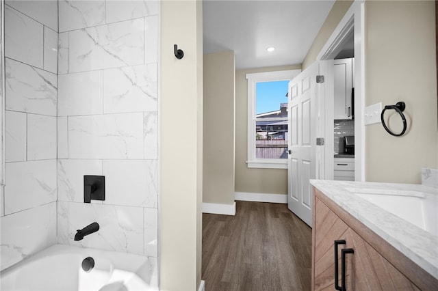 1317 Indiana Ave, Monaca, PA 15061 - bathroom with vanity, wood finished floors, and bathing tub / shower combination