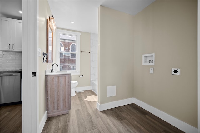 1317 Indiana Ave, Monaca, PA 15061 - laundry room featuring hookup for an electric dryer, washer hookup, dark wood-style flooring, and recessed lighting