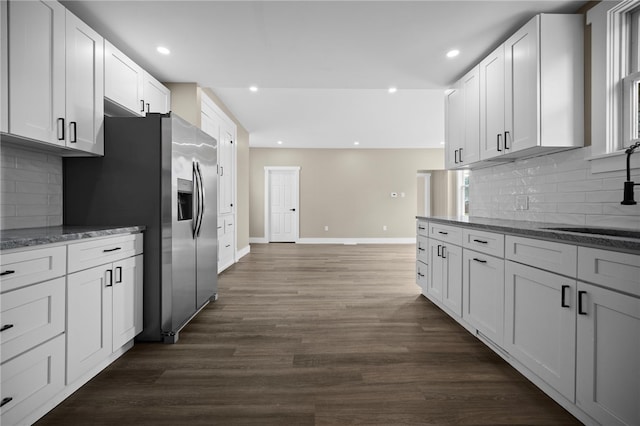 1317 Indiana Ave, Monaca, PA 15061 - kitchen featuring stainless steel fridge with ice dispenser, light stone countertops, tasteful backsplash, white cabinetry, and recessed lighting