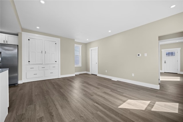 1317 Indiana Ave, Monaca, PA 15061 - unfurnished living room with dark wood-type flooring and recessed lighting