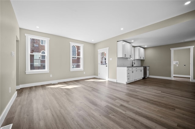 1317 Indiana Ave, Monaca, PA 15061 - unfurnished living room featuring dark wood finished floors and recessed lighting