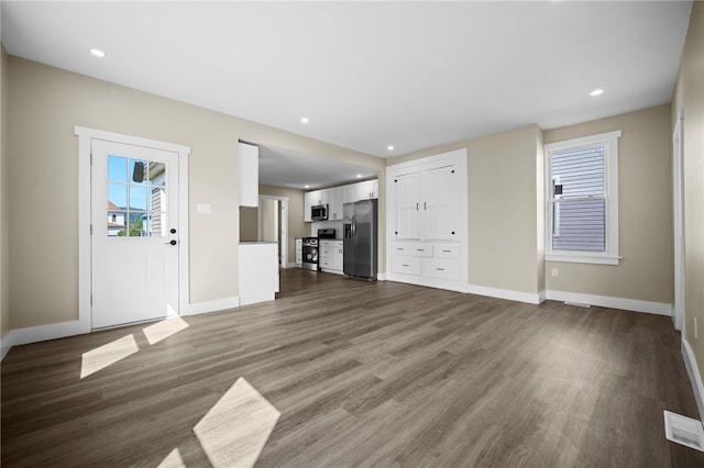 1317 Indiana Ave, Monaca, PA 15061 - unfurnished living room featuring dark wood finished floors and recessed lighting