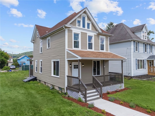 1317 Indiana Ave, Monaca, PA 15061 - view of front of house featuring a porch, a front lawn, and roof with shingles