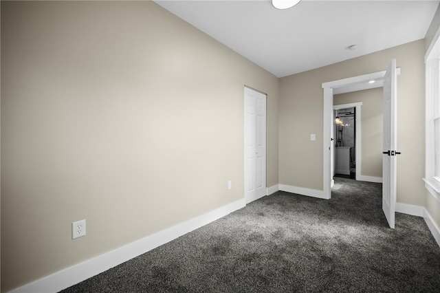 1317 Indiana Ave, Monaca, PA 15061 - unfurnished room featuring dark colored carpet and baseboards