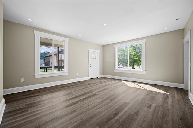 1317 Indiana Ave, Monaca, PA 15061 - unfurnished living room with dark wood-style flooring and recessed lighting