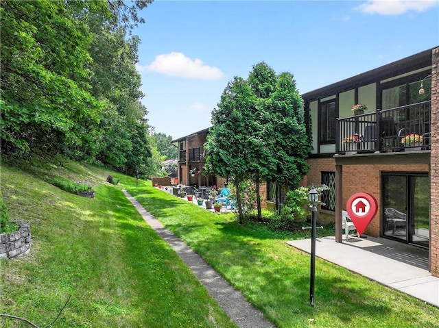 2011 Thornberry Dr, Ross Twp, PA 15237 - view of green lawn featuring a balcony and a patio area