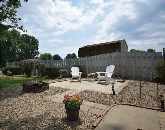 321 Hansen Ave, Franklin Twp, PA 16117 - view of patio / terrace with an outdoor fire pit