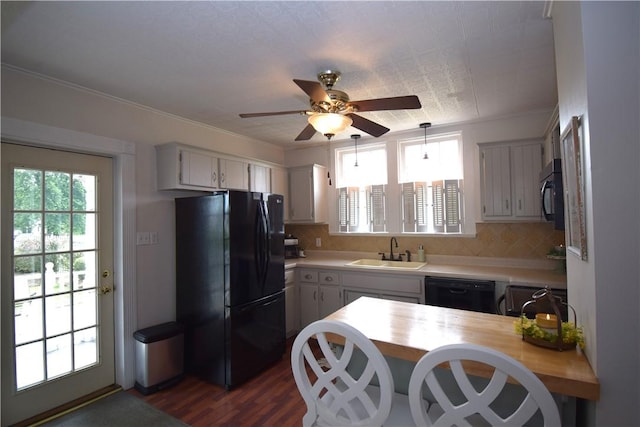 321 Hansen Ave, Franklin Twp, PA 16117 - kitchen with black appliances, plenty of natural light, light countertops, ceiling fan, and ornamental molding