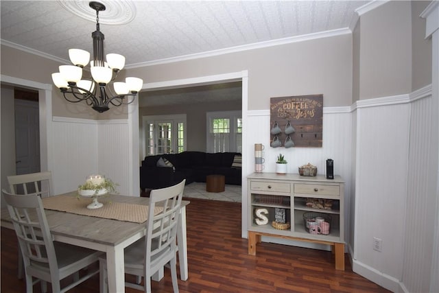 321 Hansen Ave, Franklin Twp, PA 16117 - dining room with a chandelier, a wainscoted wall, wood finished floors, and ornamental molding