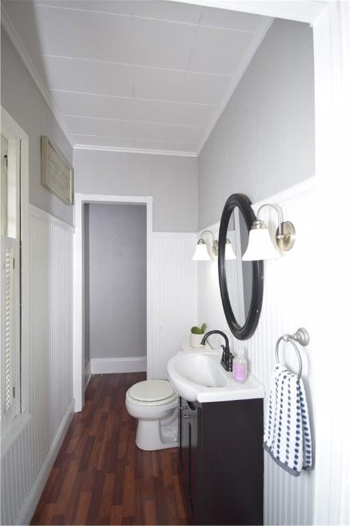 321 Hansen Ave, Franklin Twp, PA 16117 - bathroom featuring vanity, wainscoting, and wood finished floors