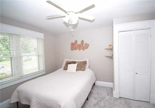 321 Hansen Ave, Franklin Twp, PA 16117 - bedroom with light carpet, a closet, and a ceiling fan