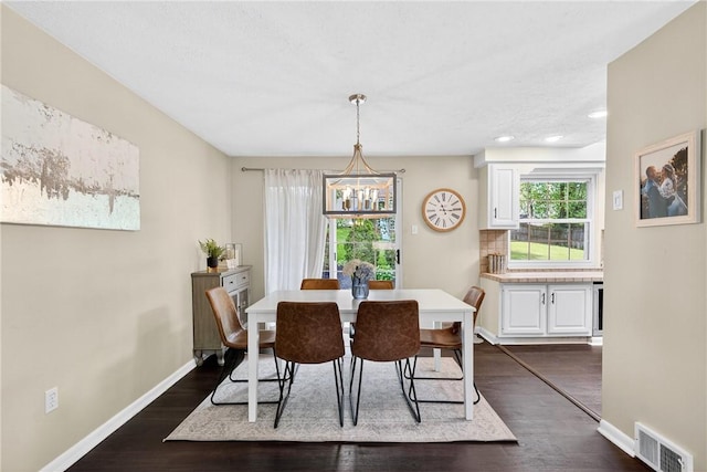 555 Madison St, Mccandless, PA 15237 - dining room with a chandelier, plenty of natural light, dark wood finished floors, and recessed lighting
