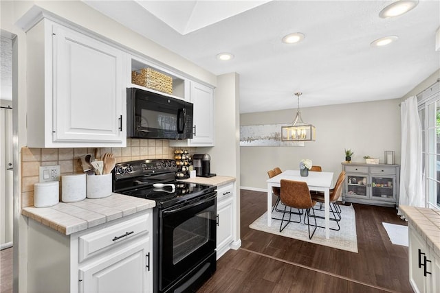 555 Madison St, Mccandless, PA 15237 - kitchen with black appliances, tasteful backsplash, white cabinets, dark wood-type flooring, and recessed lighting