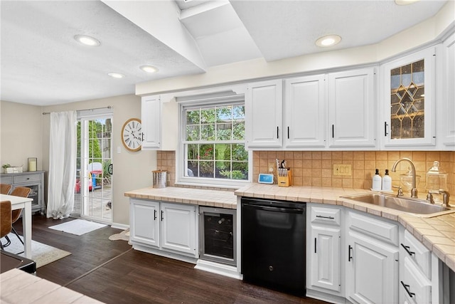 555 Madison St, Mccandless, PA 15237 - kitchen with black dishwasher, wine cooler, tile counters, healthy amount of natural light, and recessed lighting