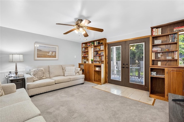 1615 Wicklines Ln, Troy Hill, PA 15212 - living area with carpet floors, french doors, ceiling fan, and tile patterned floors