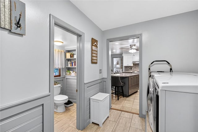1615 Wicklines Ln, Troy Hill, PA 15212 - laundry area featuring independent washer and dryer, ceiling fan, and wood finish floors