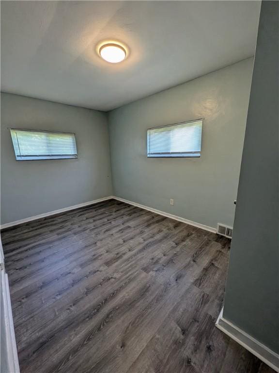 1310 Pirl St, Mckeesport, PA 15132 - unfurnished room with dark wood-style flooring and baseboards