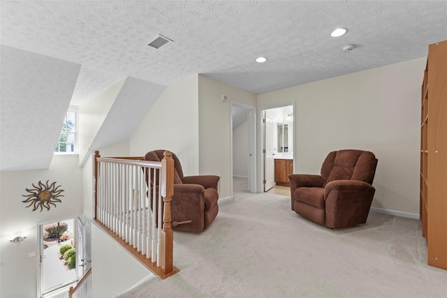 304 Horizon Dr, Monroeville, PA 15146 - living area with light carpet, a textured ceiling, recessed lighting, and an upstairs landing