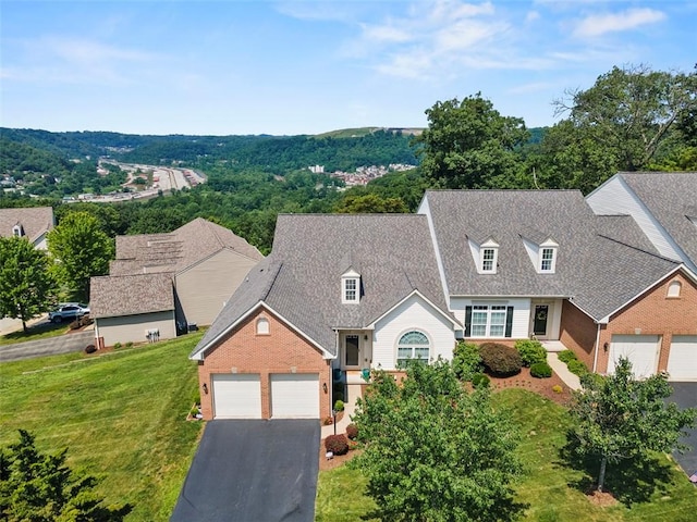 304 Horizon Dr, Monroeville, PA 15146 - cape cod-style house with driveway, brick siding, an attached garage, and a front yard