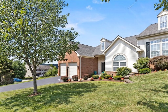 304 Horizon Dr, Monroeville, PA 15146 - view of front of home featuring driveway, an attached garage, a front yard, brick siding, and roof with shingles