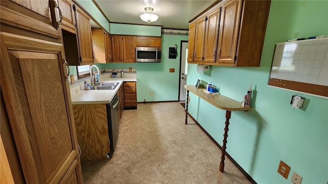 881 Bonniebrook Rd, City Of But Nw, PA 16002 - kitchen featuring appliances with stainless steel finishes, light floors, light countertops, and brown cabinetry