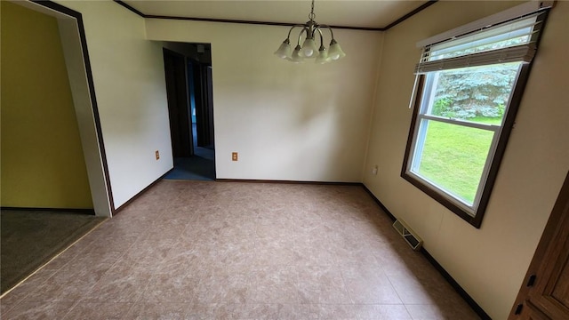 881 Bonniebrook Rd, City Of But Nw, PA 16002 - spare room featuring crown molding and a chandelier