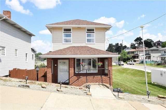 404 Emerson, Munhall, PA 15120 - american foursquare style home with covered porch, brick siding, and a shingled roof