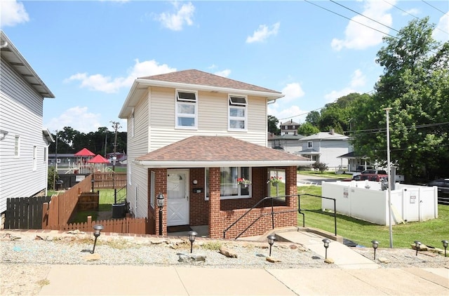404 Emerson, Munhall, PA 15120 - traditional style home with a shingled roof, brick siding, and covered porch