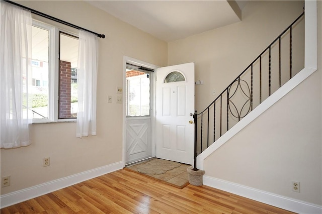 404 Emerson, Munhall, PA 15120 - foyer with wood finished floors and stairs