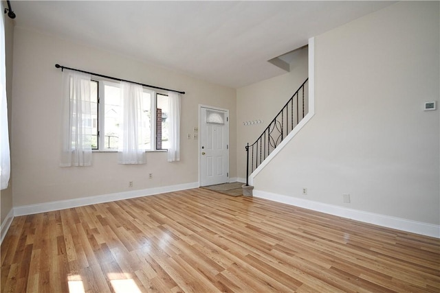 404 Emerson, Munhall, PA 15120 - foyer featuring light wood-type flooring and stairs