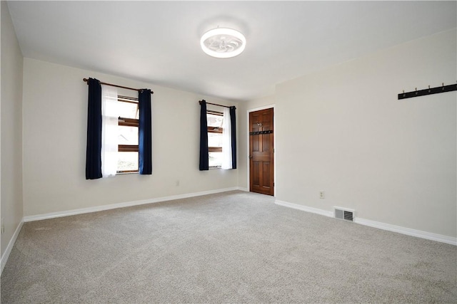 404 Emerson, Munhall, PA 15120 - carpeted spare room with baseboards