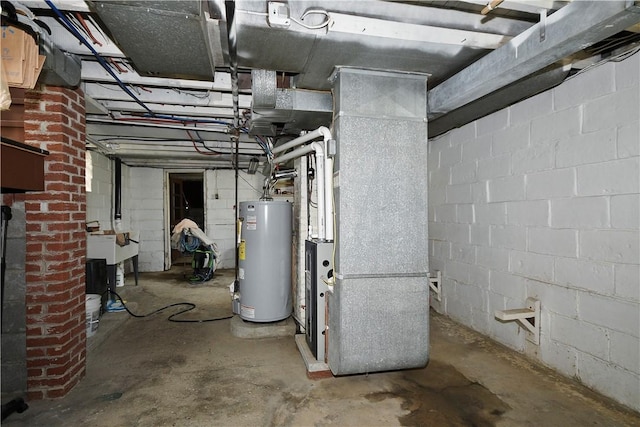 404 Emerson, Munhall, PA 15120 - unfinished basement featuring water heater and heating unit
