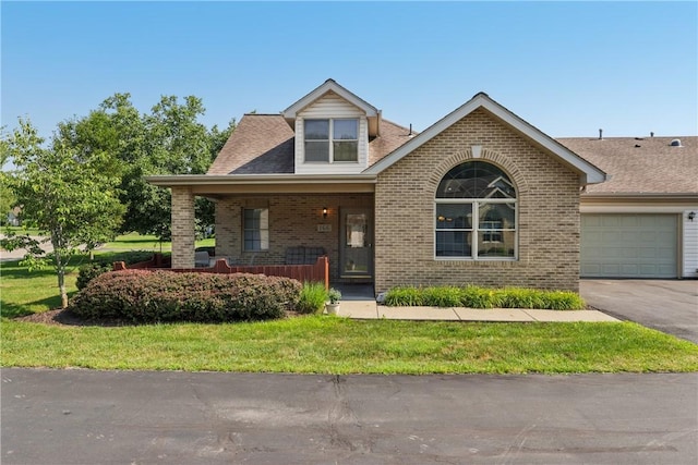 166 Steeplechase Cir, West Deer, PA 15044 - view of front of house with brick siding, driveway, covered porch, and a garage