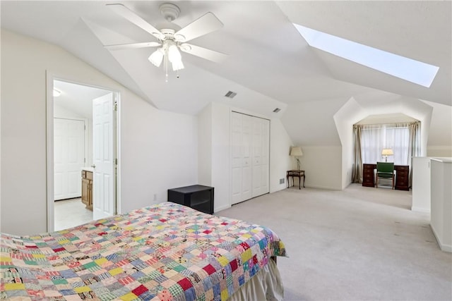 166 Steeplechase Cir, West Deer, PA 15044 - carpeted bedroom with vaulted ceiling, a closet, a ceiling fan, a skylight, and ensuite bathroom