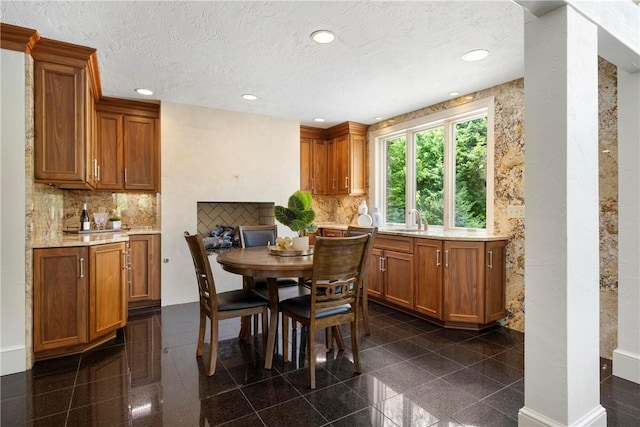 143 N Dr, Fox Chapel, PA 15238 - dining area featuring granite tiled floors, recessed lighting, and a textured ceiling