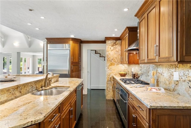 143 N Dr, Fox Chapel, PA 15238 - kitchen featuring stainless steel appliances, brown cabinets, recessed lighting, ventilation hood, and decorative backsplash