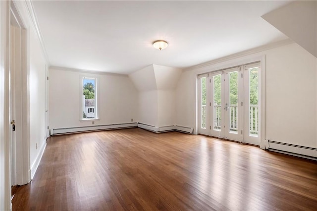 143 N Dr, Fox Chapel, PA 15238 - additional living space with plenty of natural light, wood finished floors, baseboard heating, and a baseboard radiator