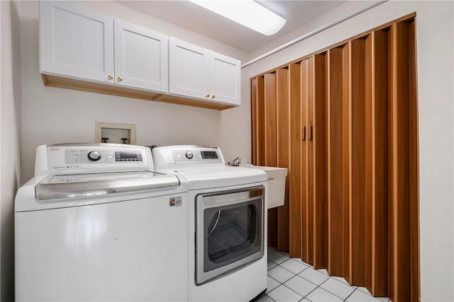 143 N Dr, Fox Chapel, PA 15238 - washroom featuring independent washer and dryer, cabinet space, and light tile patterned floors