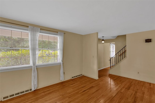 1449 Parkview Dr, Mccandless, PA 15101 - empty room with light wood-style flooring and stairs