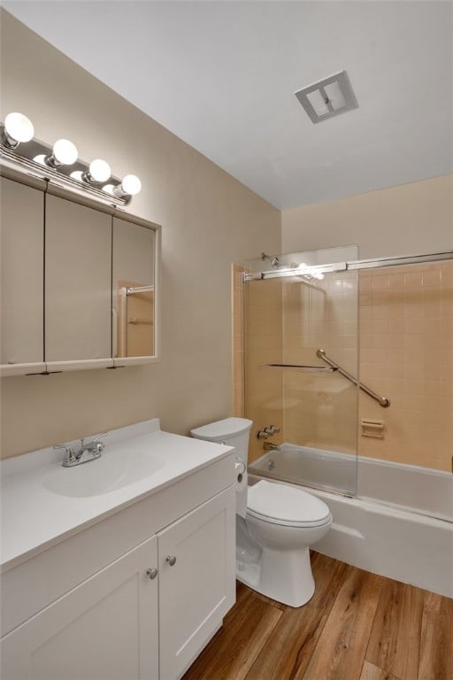 1449 Parkview Dr, Mccandless, PA 15101 - bathroom featuring wood finished floors, vanity, and enclosed tub / shower combo