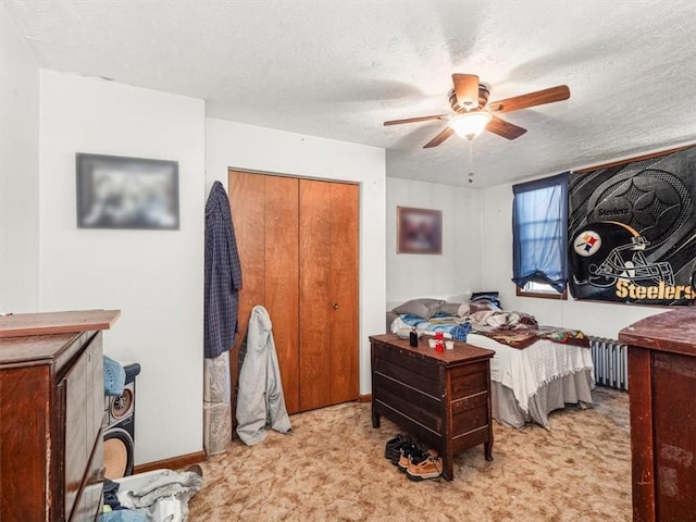 109 Ella St, Mckees Rocks, PA 15136 - bedroom featuring carpet, a textured ceiling, ceiling fan, and a closet