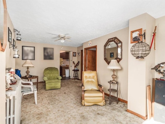 109 Ella St, Mckees Rocks, PA 15136 - carpeted living area with a ceiling fan and baseboards